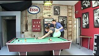 Busty slut rides a solid cock on the pool table