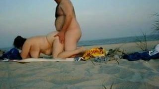 Chubby Couple have sex on the beach