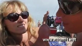 sucer des bites sur la plage par naomi1