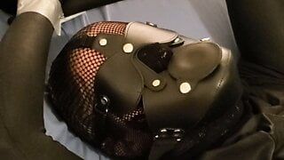 Ballgagged in overall catsuit. Cum with plastic hood
