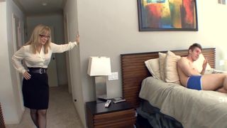 Big boobed blonde milf in stockings and a garter