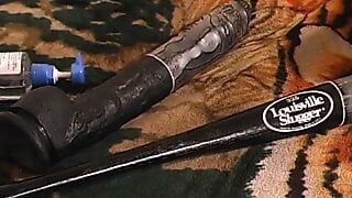 Kinky babe shoves a long wooden pole in her fuckhole