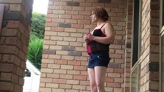 Sissy outdoors daytime walk out front of house