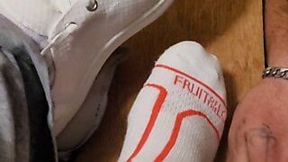 Sock trampling his dick