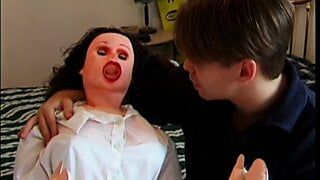 Horny stud’s blow up doll comes alive and he fucks her in bed