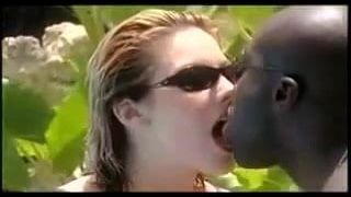 Hot interraical tongue kissing by the pool
