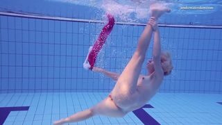 Russian hot babe Elena Proklova swims naked