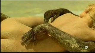 Young blonde white girl with black lover on the beach – Interracial