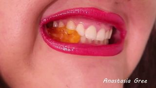Extreme close-up of the teeth of Model Anastasia Gree