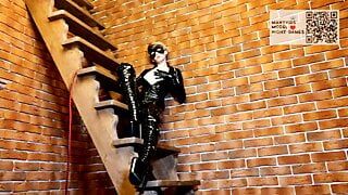 Girl in latex suit posing for the camera