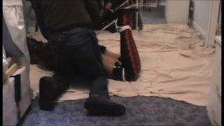 Kathy hogtied and struggling