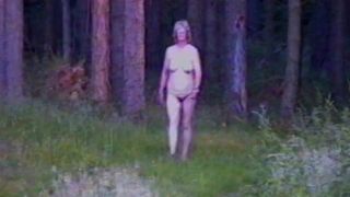 Maggie takes a nude walk in the woods