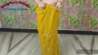 Mother wears a yellow saree