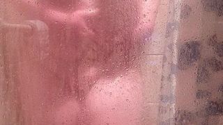 CHUBBY GIRL IN STEAMY SHOWER SCENE