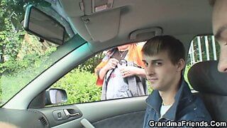 Hot grandma takes double penetration outdoors