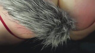 I spank my ass until it’s red and insert an anal plug with a tail