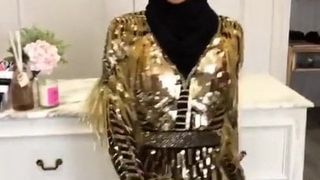 Australian hijabi model dancing on tight dress for boss