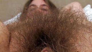 Hairy pussy babe Brooke strips down to show off her amazing fur