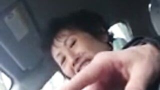 homemade, older chinese lady wanks cock in car