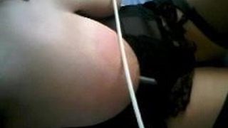 Scottosh slut gets her tits caned.