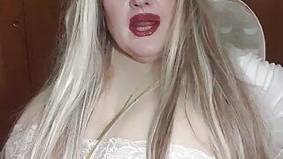 Susi as an sexy angel lying on bed with lush toy