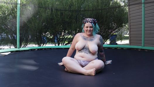 Fat Tattooed Milf Jumping and Stripping on a Trampoline