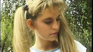 Horny little slut opens wide to deepthroat a hard cock