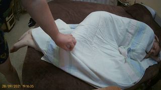 She massages the cock and gives a blowjob with cum in the mouth