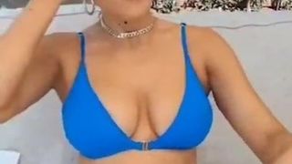 WWE – Lana AKA CJ Perry with dark hair, in a blue bikini