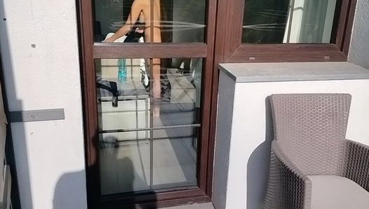 I spy on my neighbor and play with my cock.  She opens the door and starts playing with his cock too.