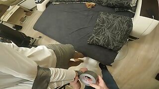 Silver tape bondage in tights and skirt