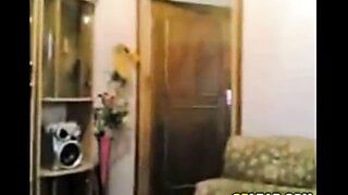 Arab wife watching husband 1