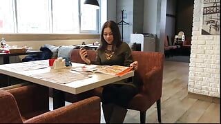 Beautiful brunette sucking cock in public toilet