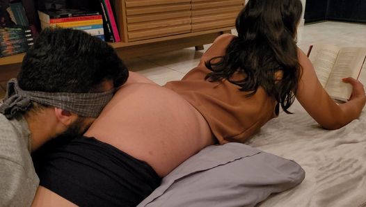 Reading a book while he sniffs and lick my ass