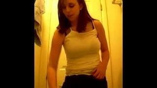 Cute girl records herself trying on bikinis for boyfriend