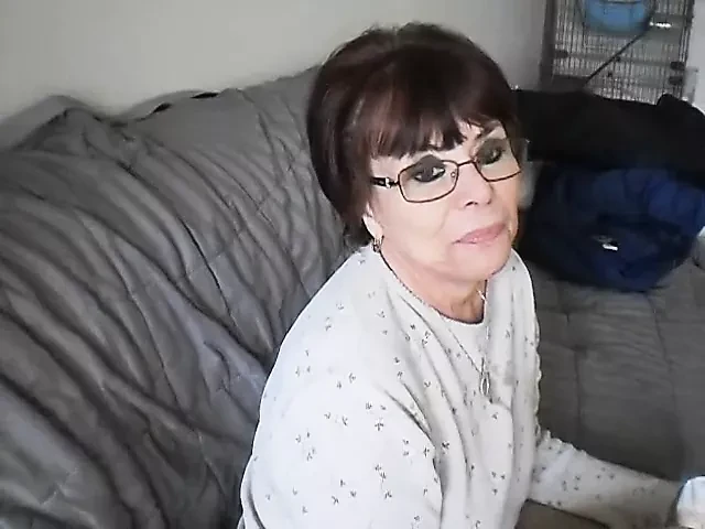 Dark Haired Granny Taking Some Cumshots