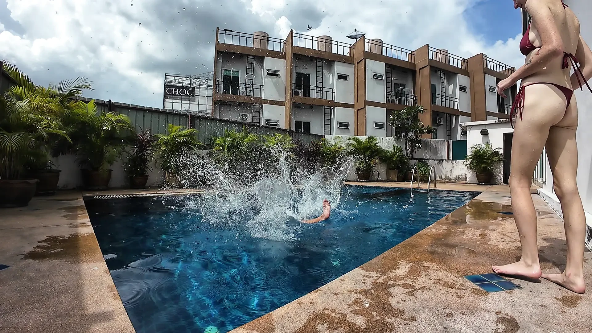 watch us playing in our swimming pool