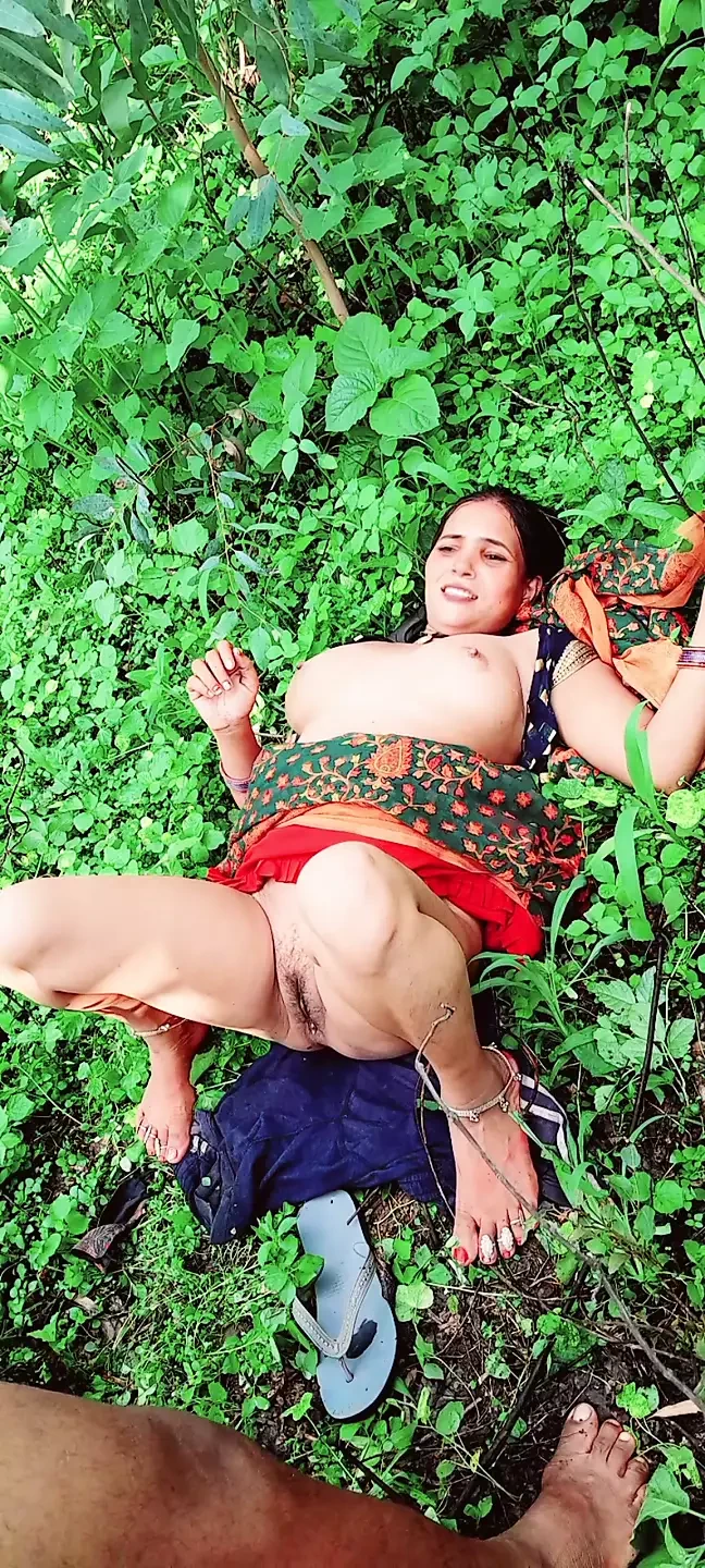 It was rainy season and sister-in-law was . Both of them went out and had sex in the garden. w’s