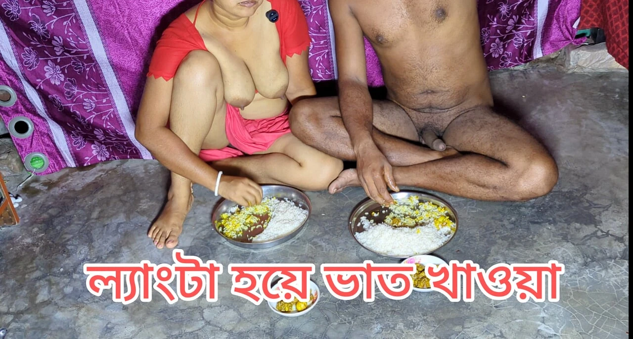 Indian husband and wife eat food