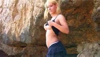 Sexy Sonia strips by the sea  FM14