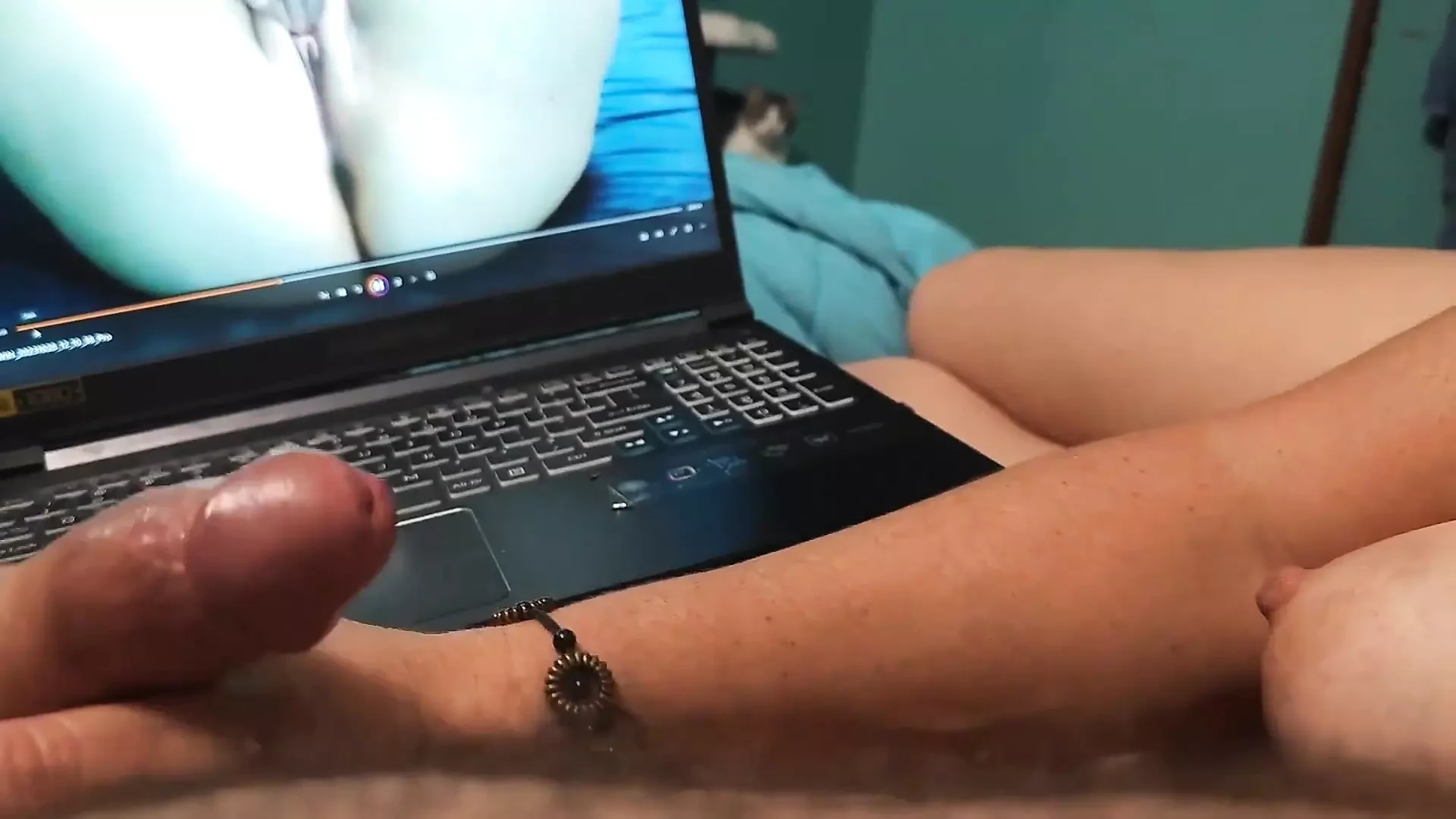 Watch Bella Spank His Cock While Watching Porn