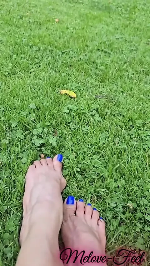 Melove Blue Nail Polish Showing her sexy feet on Grass