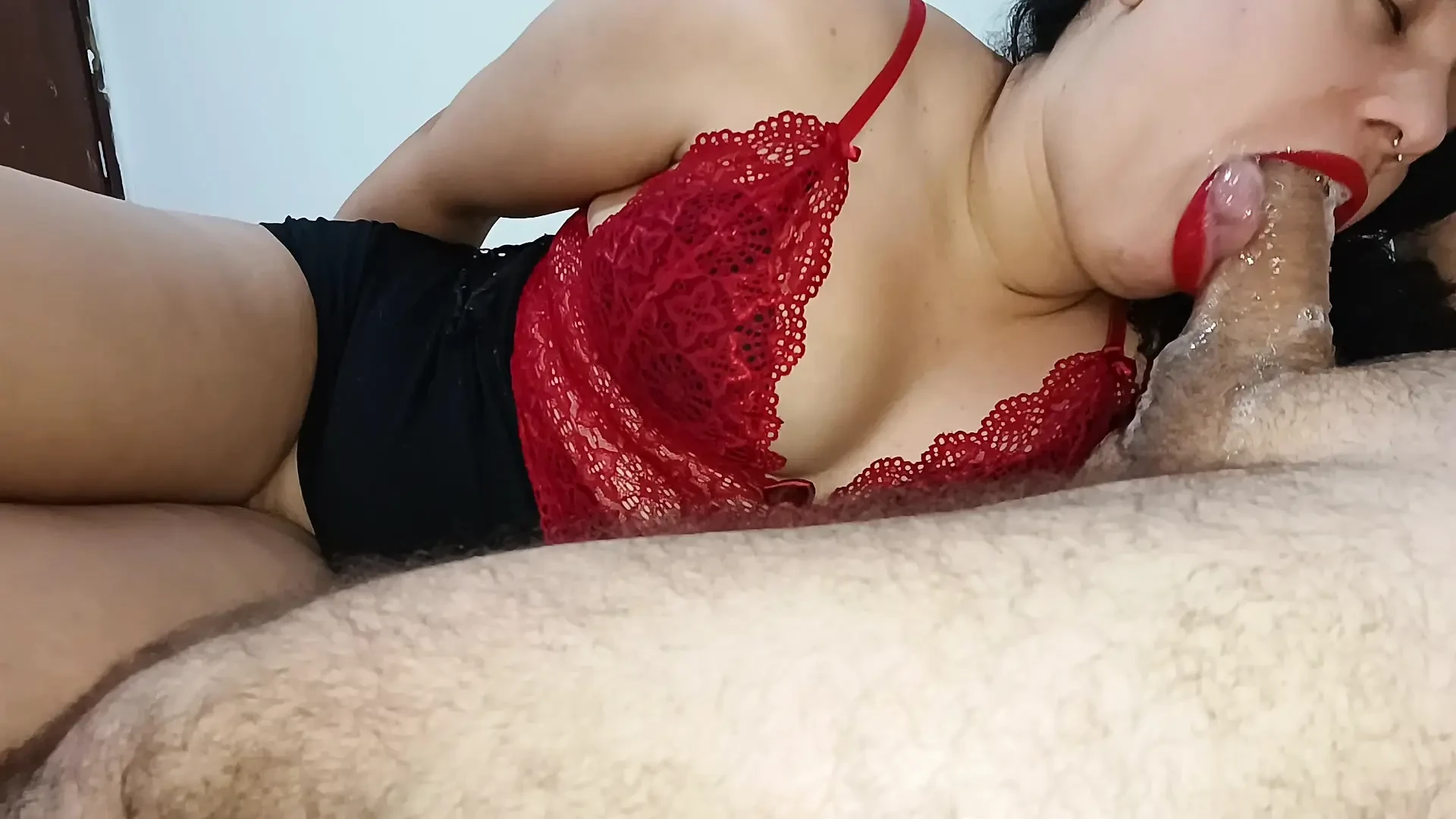 PERVERTED EBONY, WITH HER LIPS AND HER RED LANGERIE, EATING COCK