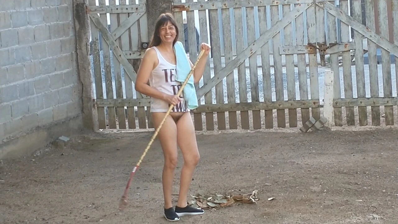 Wife without panties working in front yard teasing husband