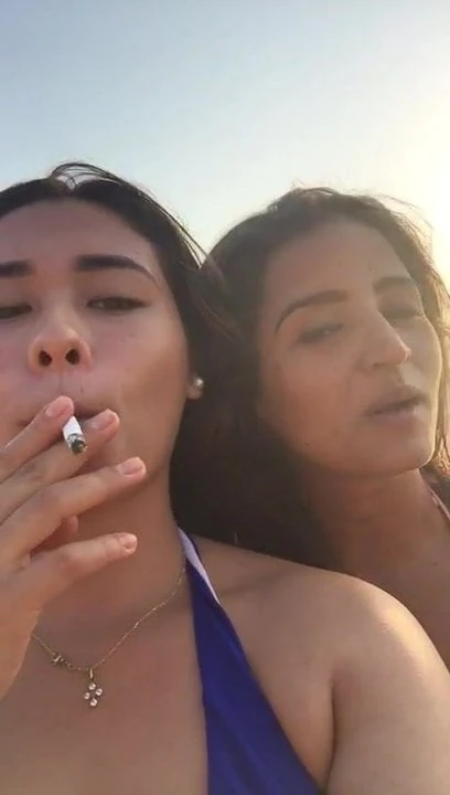 Smoking Latina lez couple Kelly and Maria