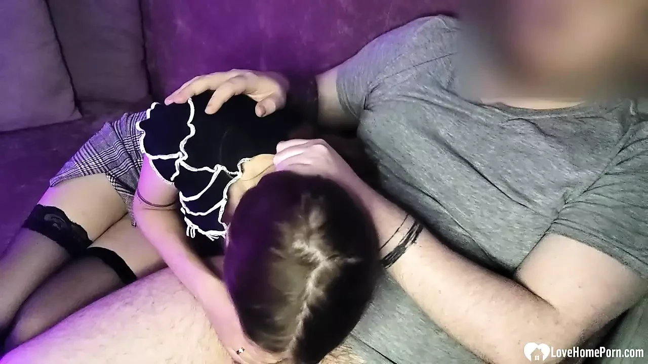 Hottie in stockings sucks dick during movie night