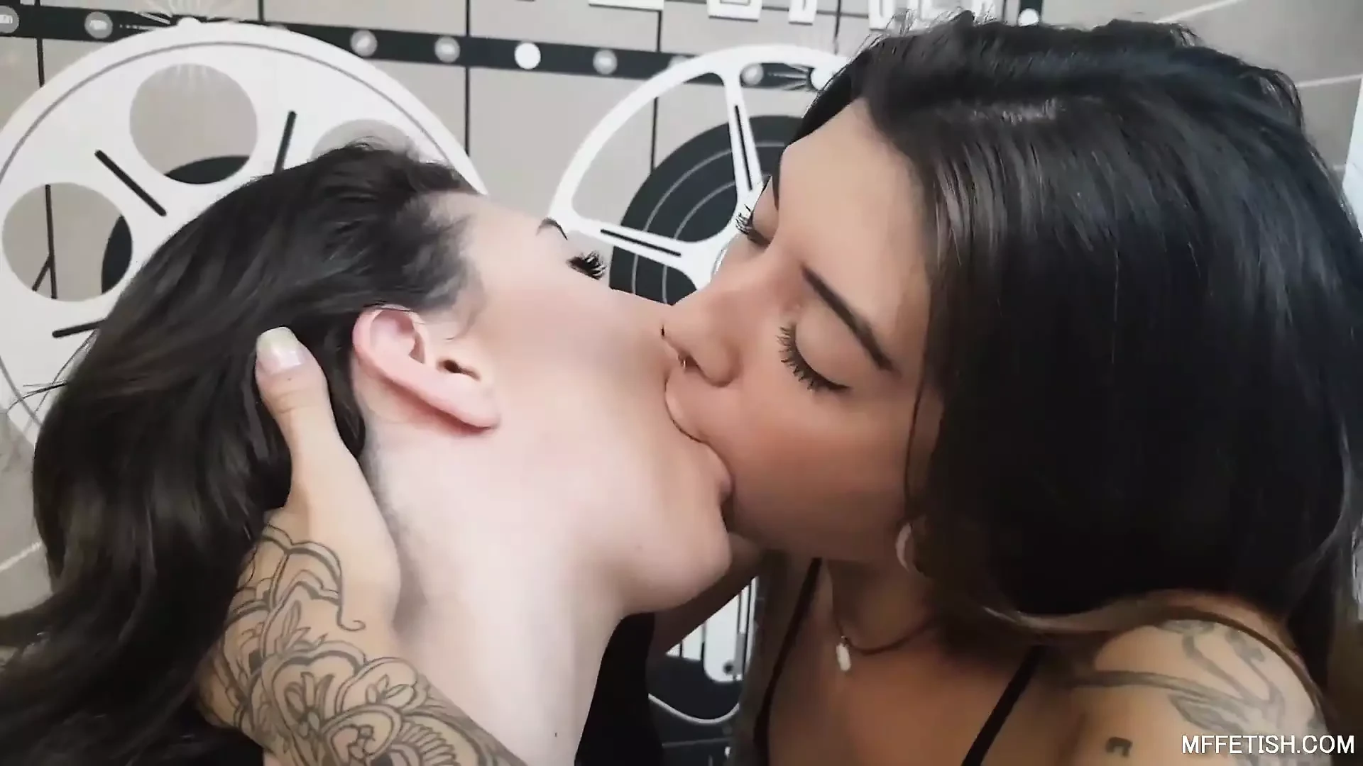 Wet tongues teasing each other