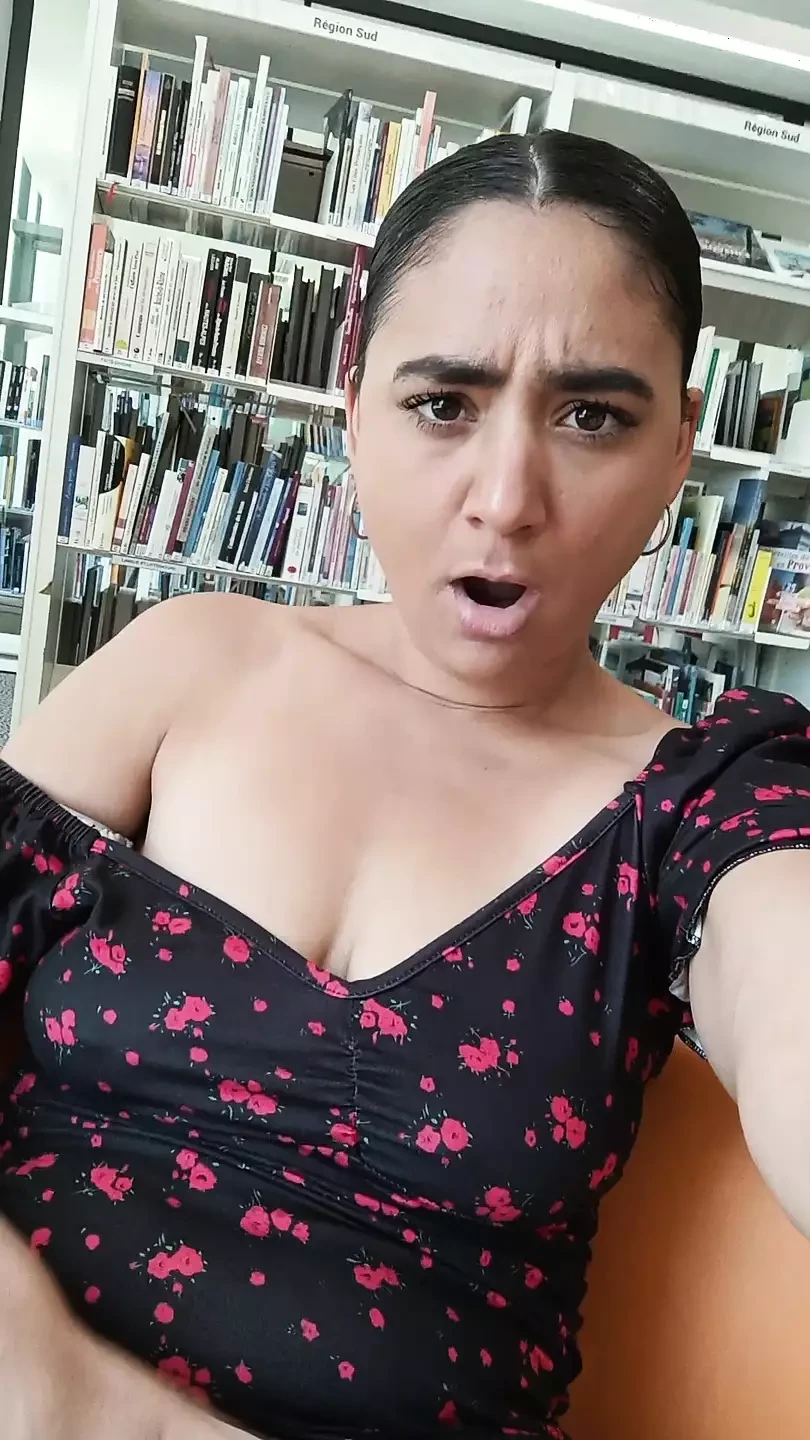 The girl at the library fingers her before reading