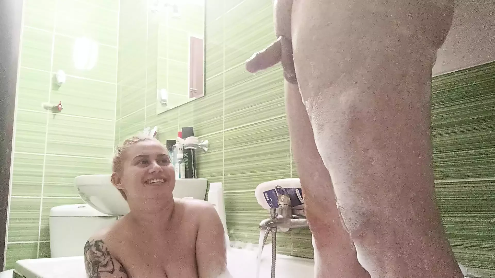 Hot blonde big natural tits clean his dick in the bath