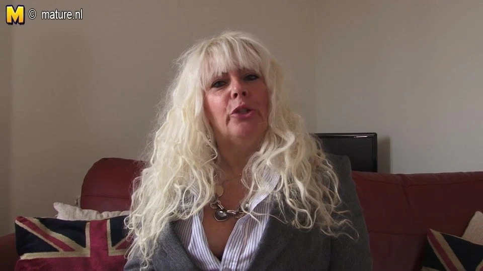 Big breasted mama playing with herself